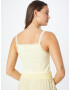 BDG Urban Outfitters Top pastelno rumena - Pepit.si