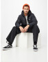 LEVI'S Prehodna jakna 'TELEGRAPH HOOD SHRT JKT BLACKS' črna - Pepit.si