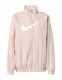 Nike Sportswear Prehodna jakna pastelno roza / bela - Pepit.si