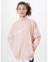 Nike Sportswear Prehodna jakna pastelno roza / bela - Pepit.si