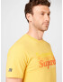 Superdry Majica rumena / rdeča / bela - Pepit.si