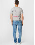 Tommy Jeans Kavbojke 'SCANTON' moder denim - Pepit.si