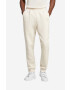 adidas Originals Spodnji del trenirke Trefoil Essentials Pants bež barva - Pepit.si