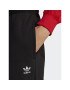 adidas Spodnji del trenirke Essentials Fleece IA6437 Črna Regular Fit - Pepit.si