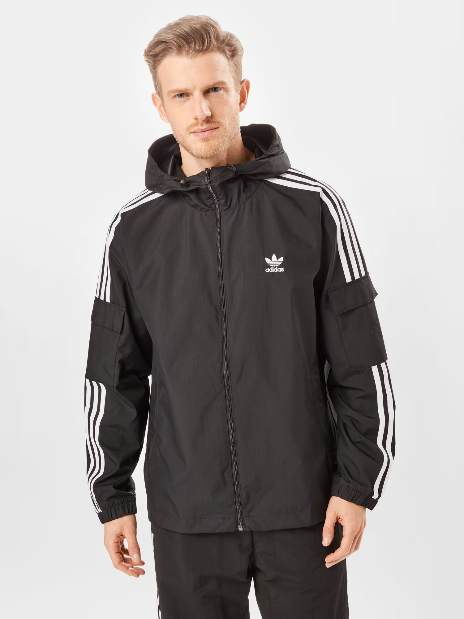 ADIDAS ORIGINALS Prehodna jakna 'Adicolor' črna / bela - Pepit.si