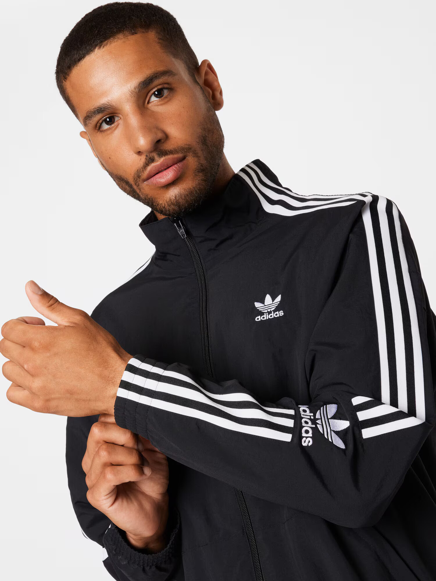 ADIDAS ORIGINALS Prehodna jakna črna / bela - Pepit.si