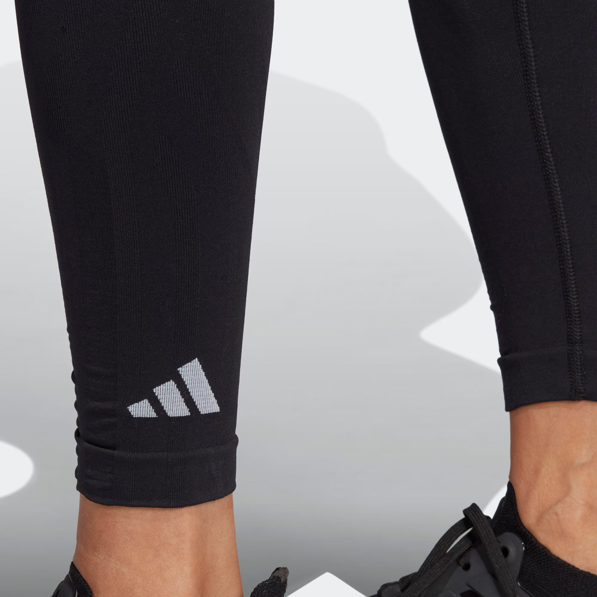 ADIDAS PERFORMANCE Športne hlače 'FORMOTION' črna / bela - Pepit.si