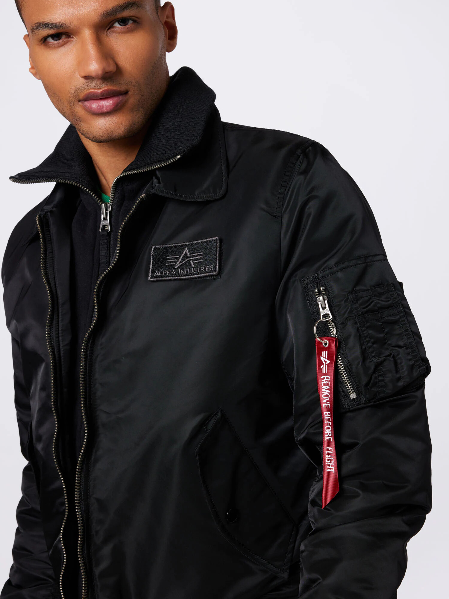 ALPHA INDUSTRIES Prehodna jakna 'CWU Jet Blast' rdeča / črna / bela - Pepit.si