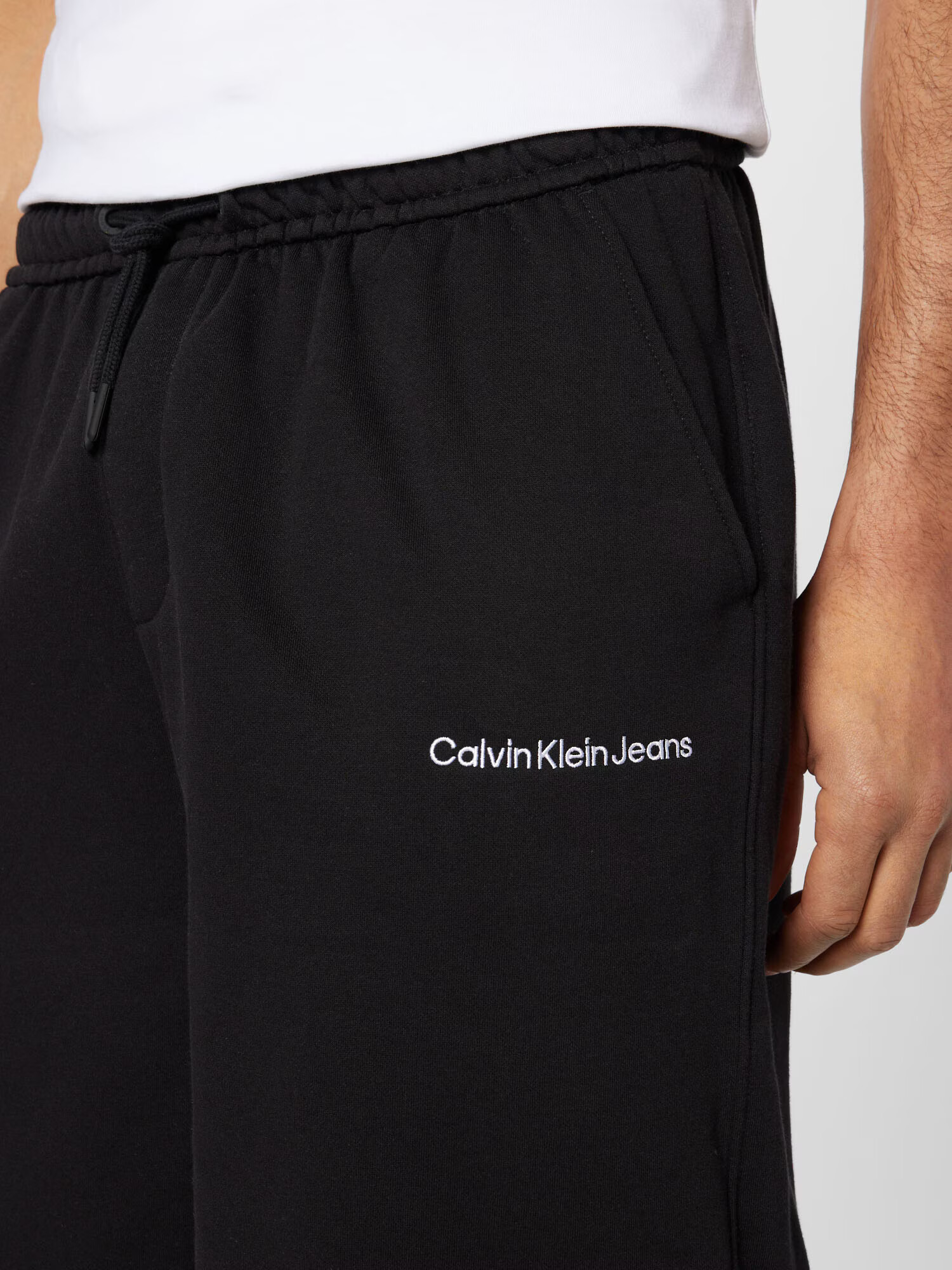 Calvin Klein Jeans Hlače črna / bela - Pepit.si