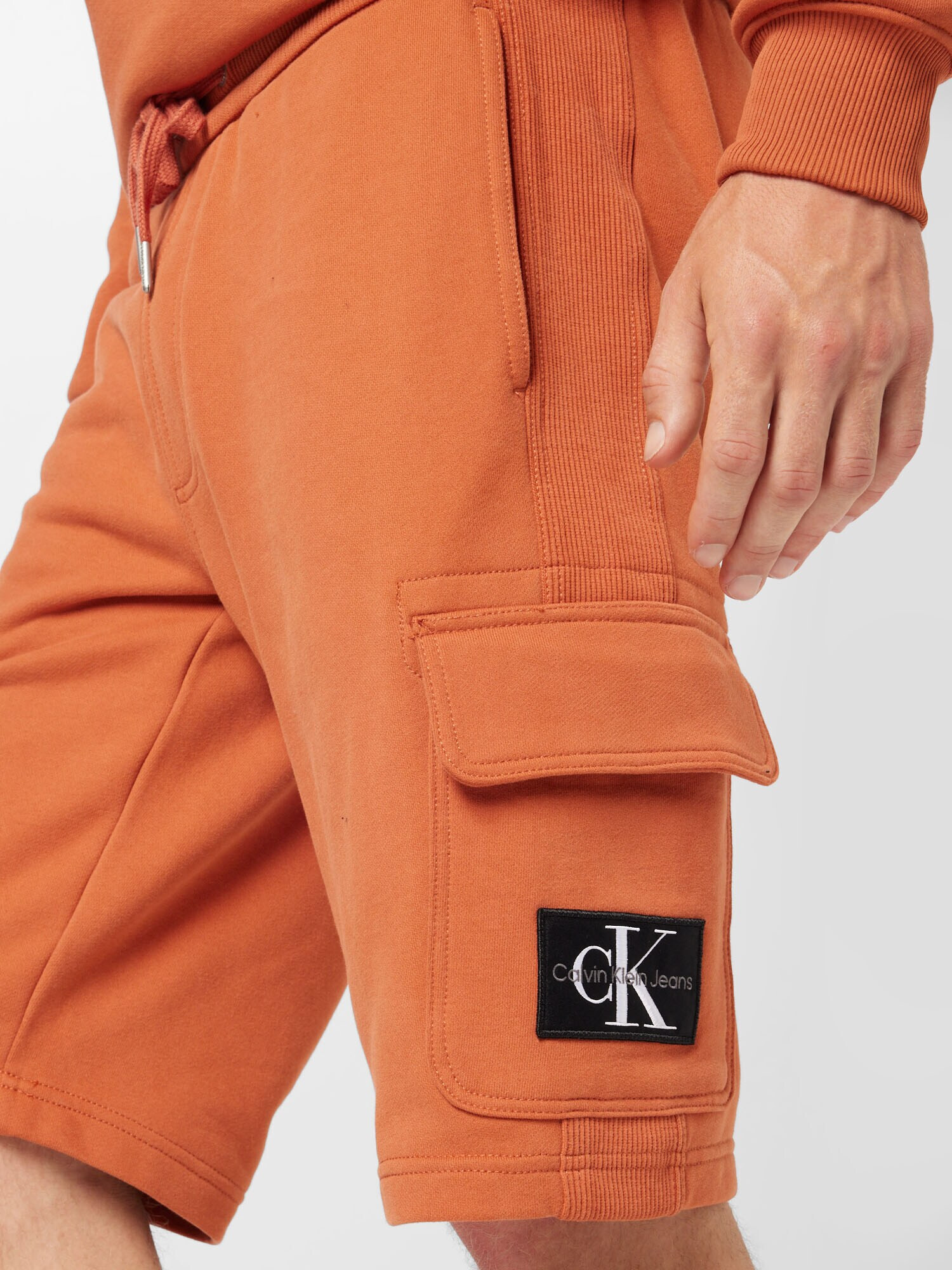 Calvin Klein Jeans Hlače oranžna - Pepit.si