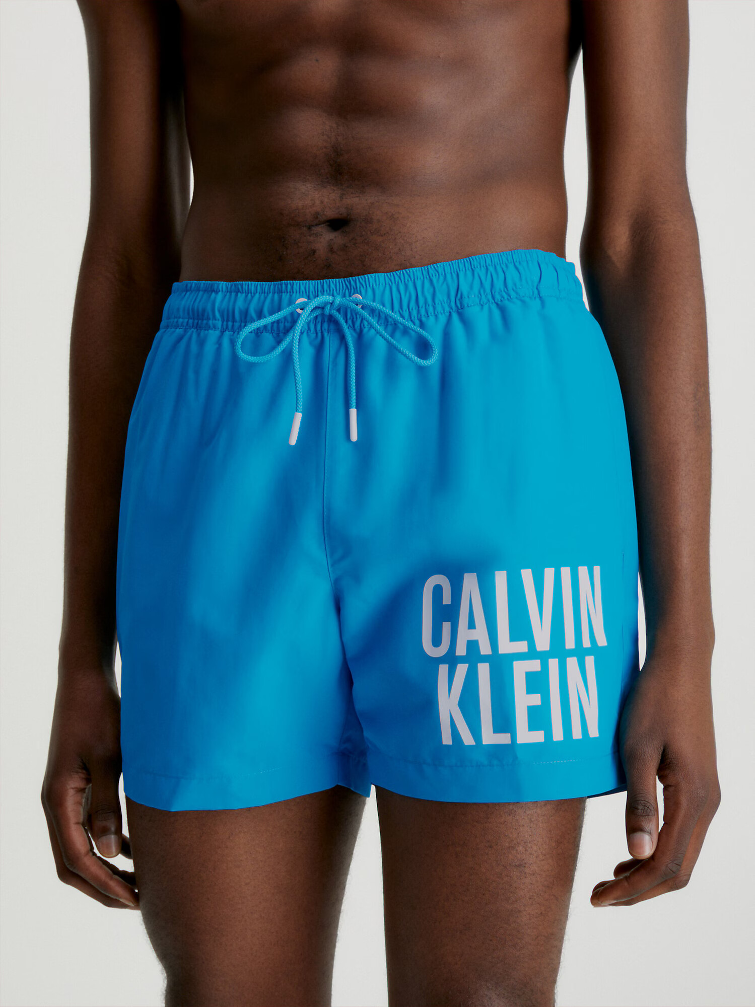 Calvin Klein Underwear Kratke kopalne hlače 'Intense Power' turkizna / bela - Pepit.si