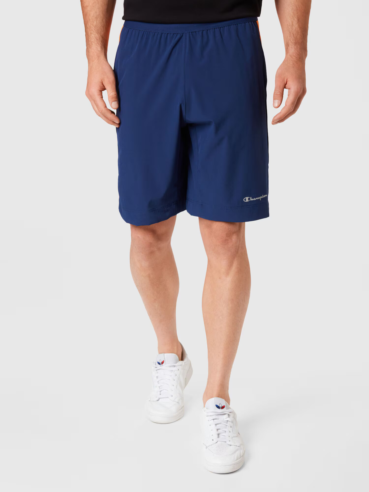 Champion Authentic Athletic Apparel Športne hlače modra / oranžna / bela - Pepit.si