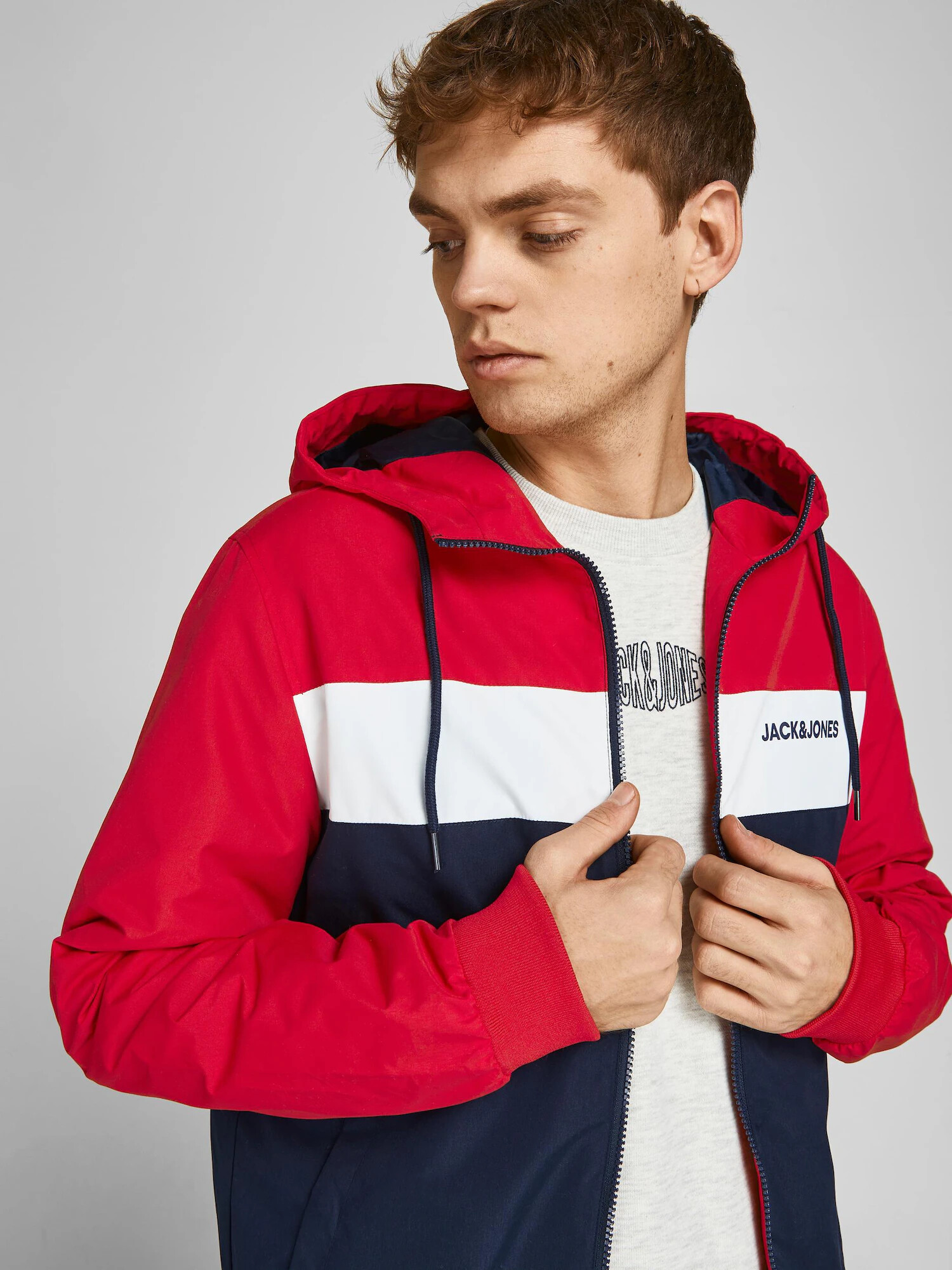 JACK & JONES Prehodna jakna 'Rush' temno modra / ognjeno rdeča / bela - Pepit.si