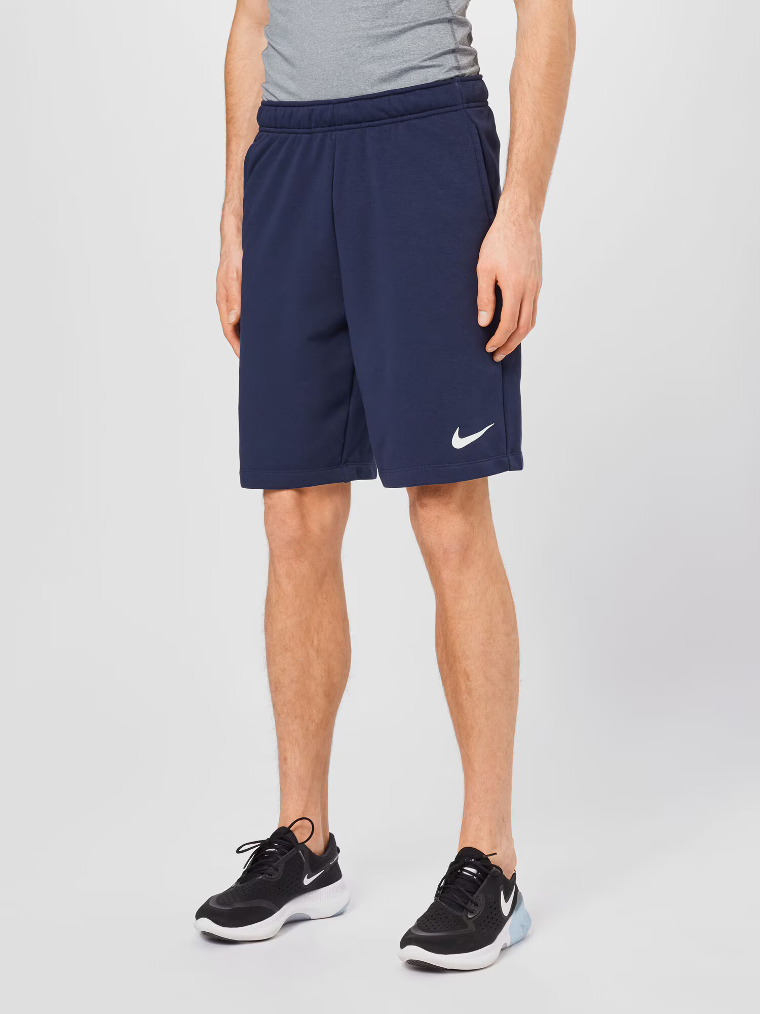 NIKE Športne hlače marine / bela - Pepit.si