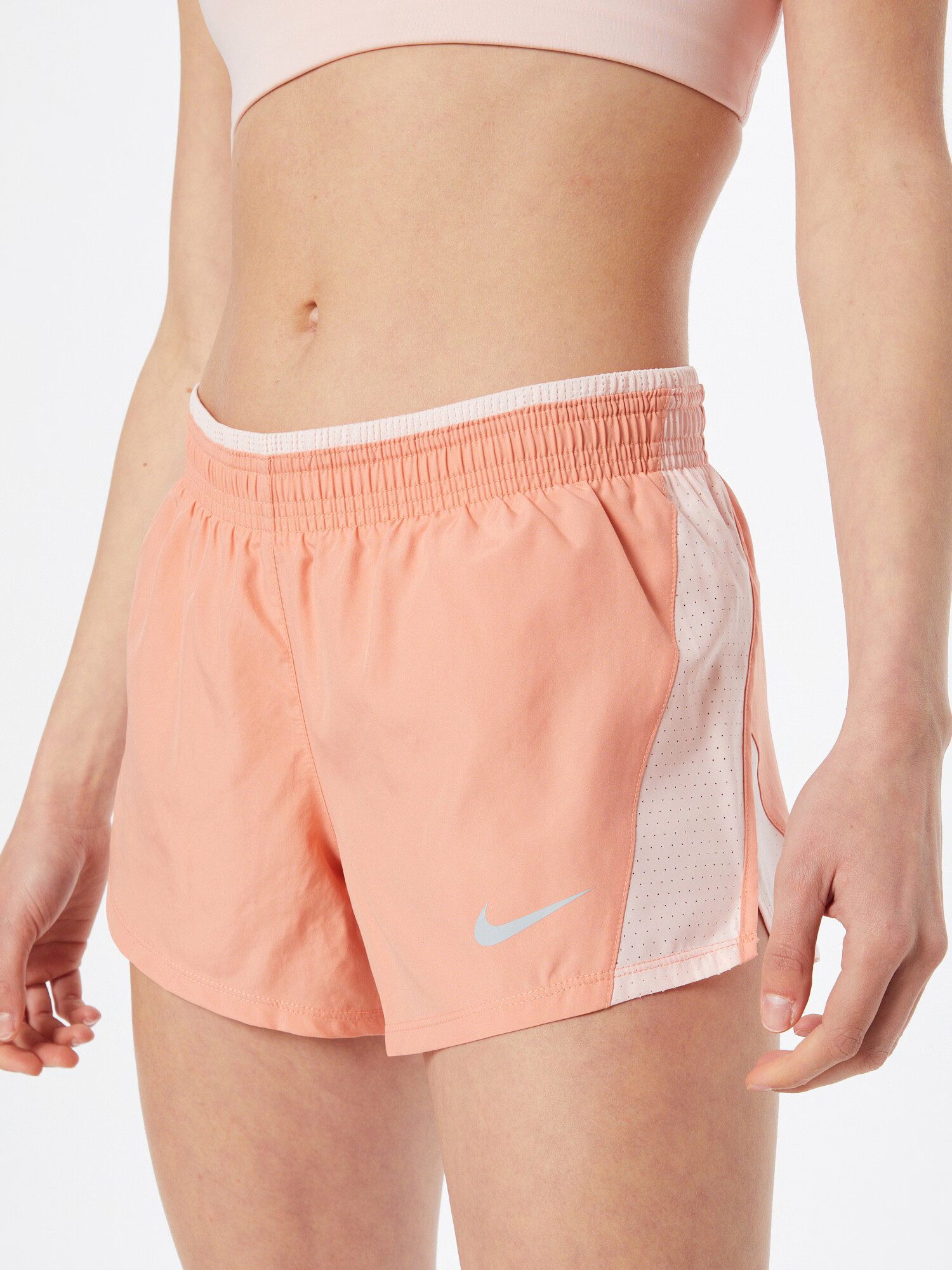 NIKE Športne hlače pastelno oranžna / bela - Pepit.si