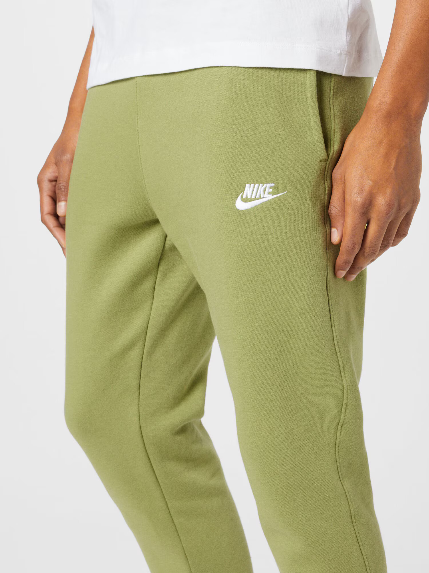 Nike Sportswear Hlače svetlo zelena / bela - Pepit.si