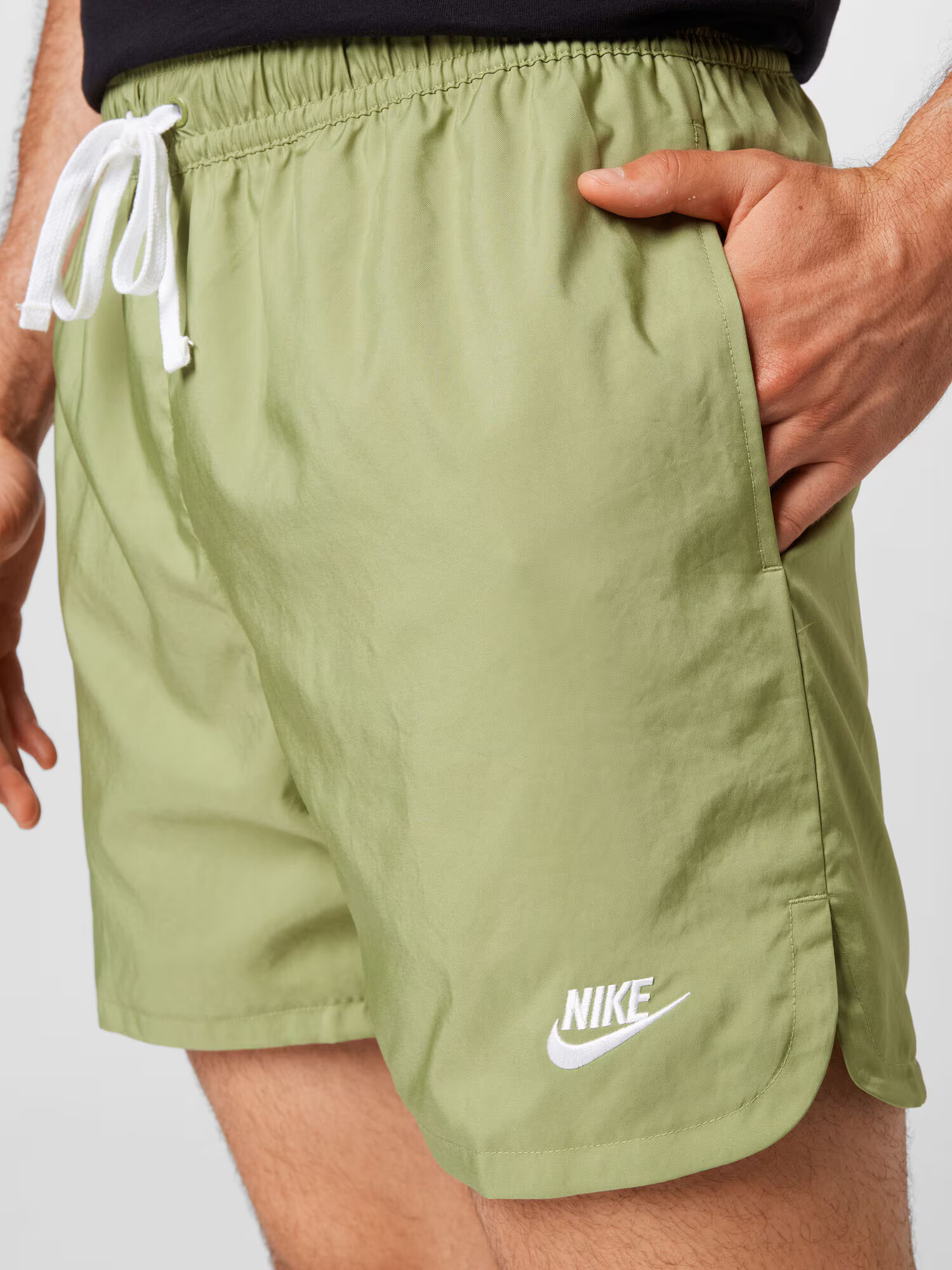 Nike Sportswear Hlače oliva / bela - Pepit.si