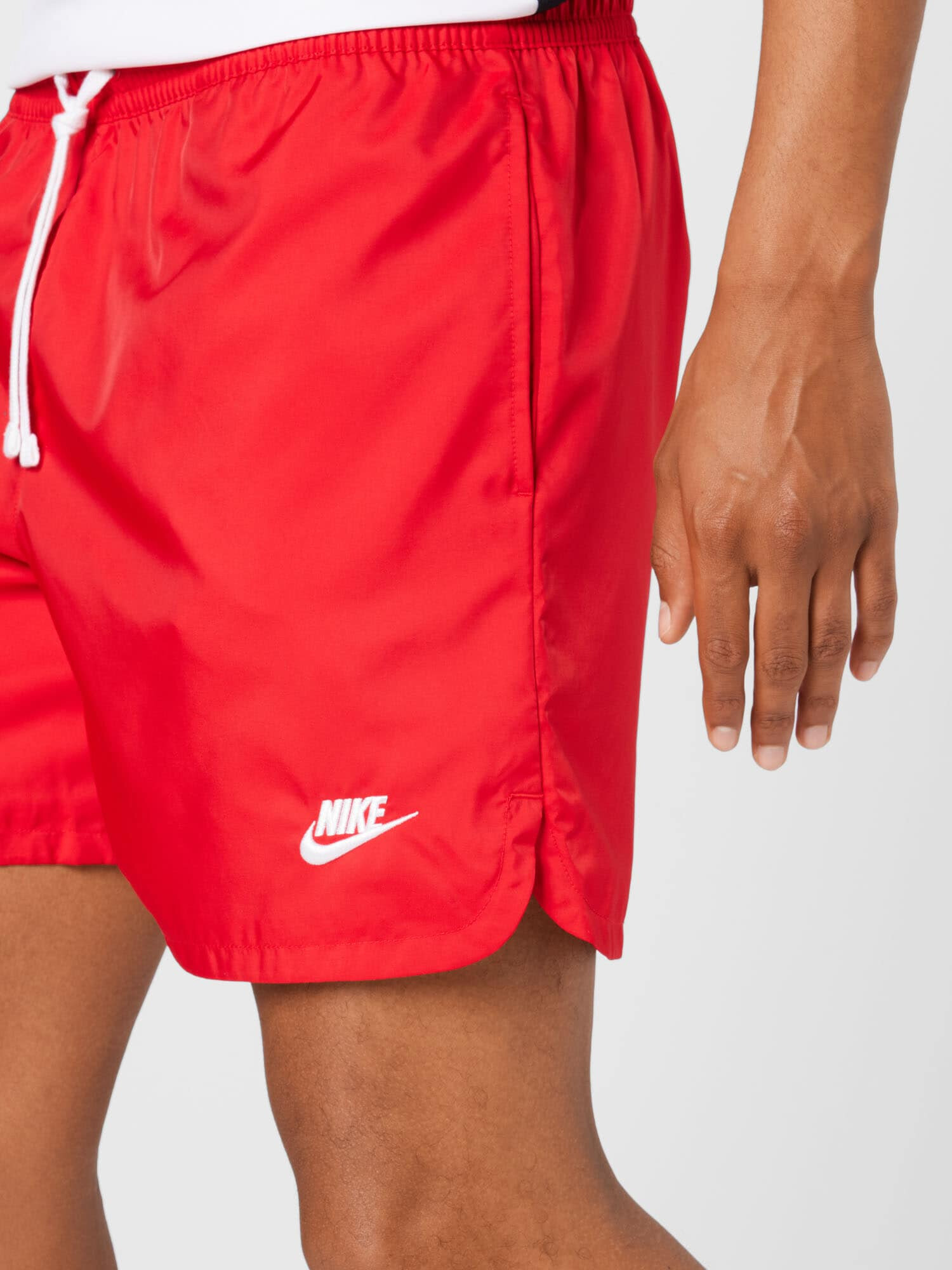 Nike Sportswear Hlače rdeča / bela - Pepit.si