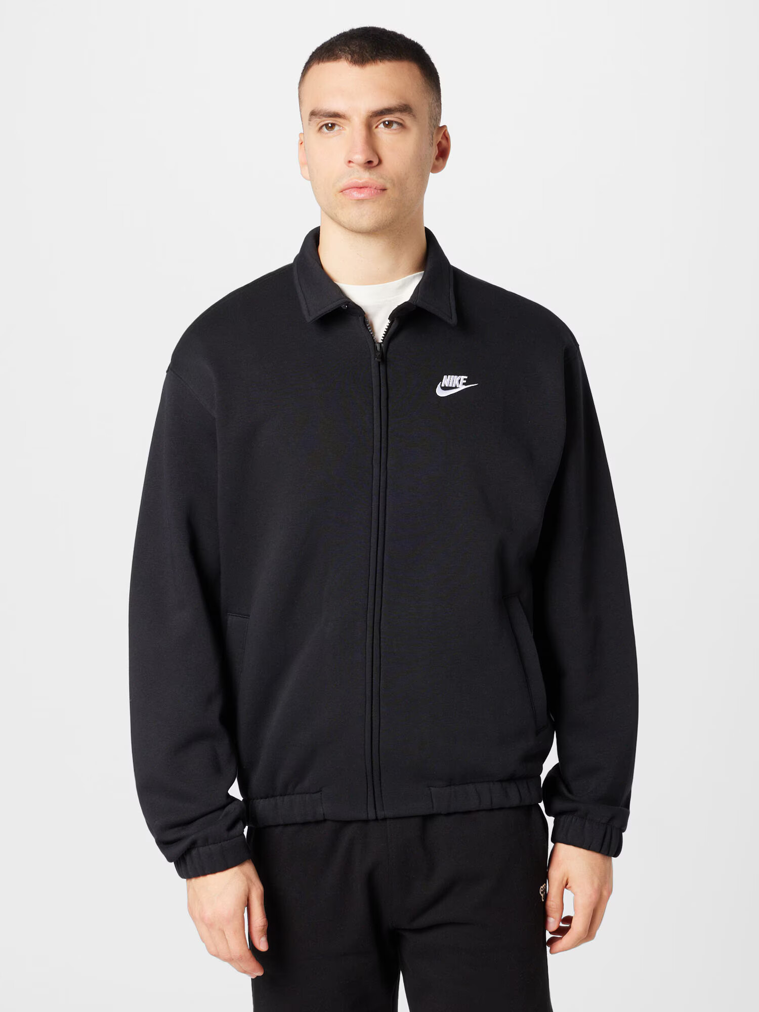 Nike Sportswear Jopa na zadrgo 'HARRINGTON' črna / bela - Pepit.si