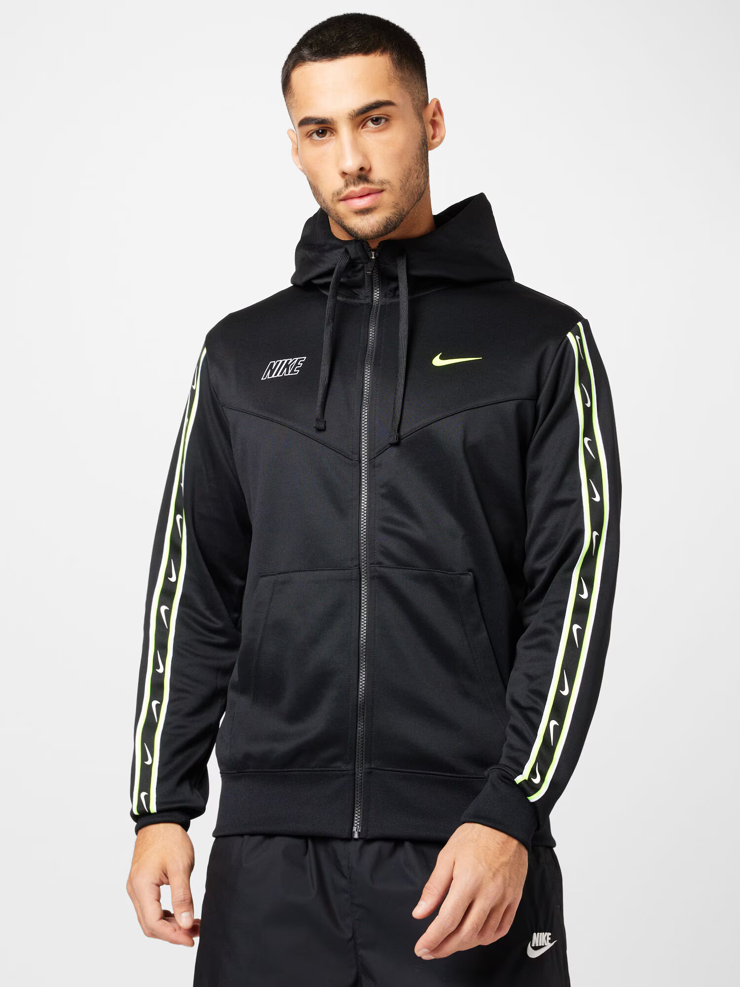 Nike Sportswear Jopa na zadrgo 'Repeat' neonsko rumena / črna / bela - Pepit.si