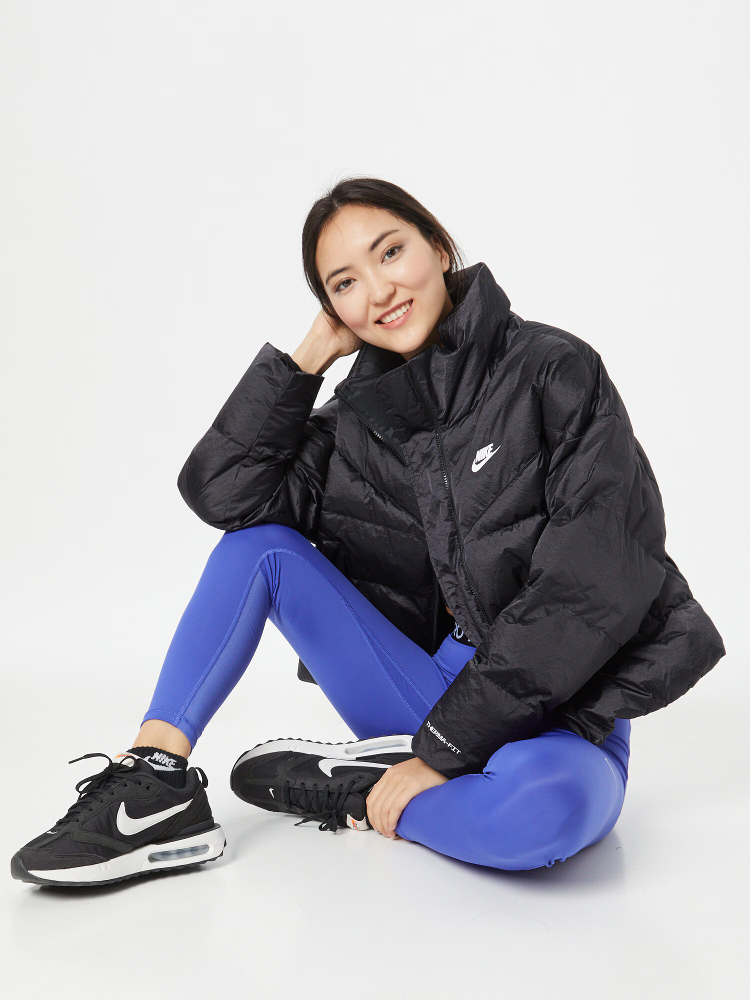 Nike Sportswear Prehodna jakna črna - Pepit.si