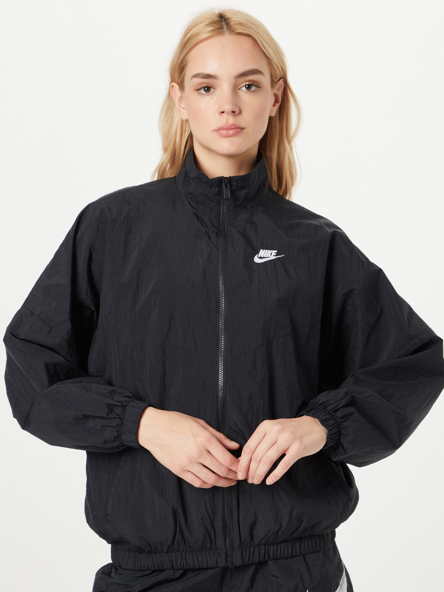 Nike Sportswear Prehodna jakna črna / bela - Pepit.si