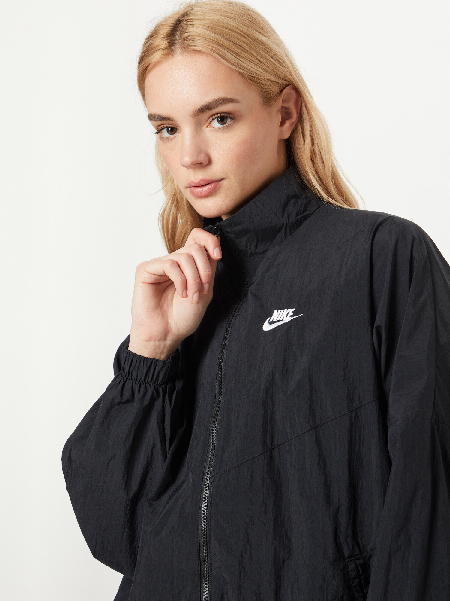 Nike Sportswear Prehodna jakna črna / bela - Pepit.si