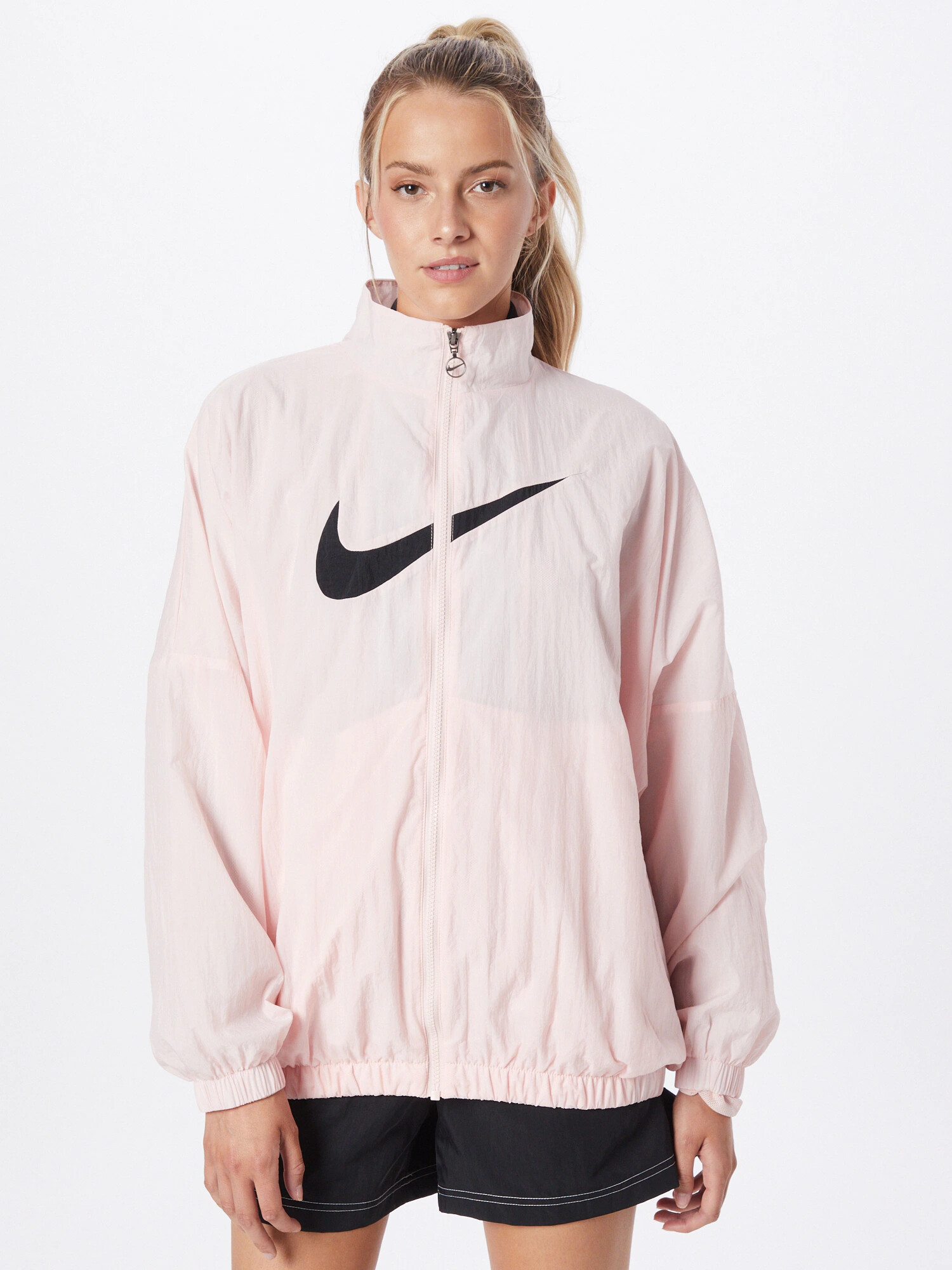 Nike Sportswear Prehodna jakna pastelno roza / črna - Pepit.si