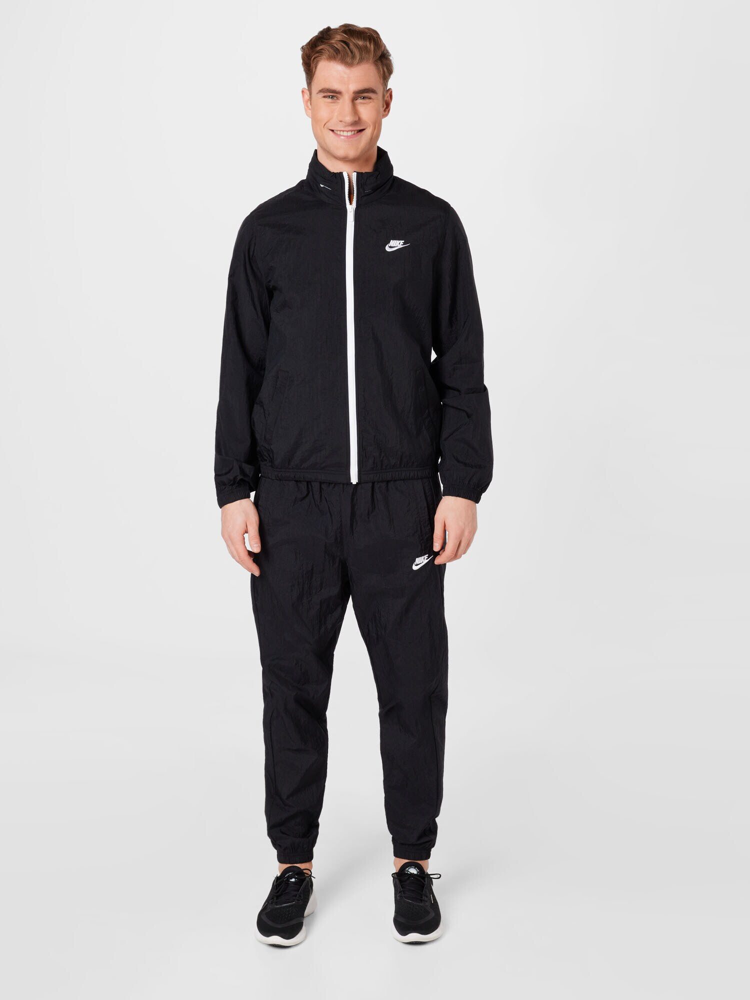 Nike Sportswear Trenirka za tek črna / bela - Pepit.si