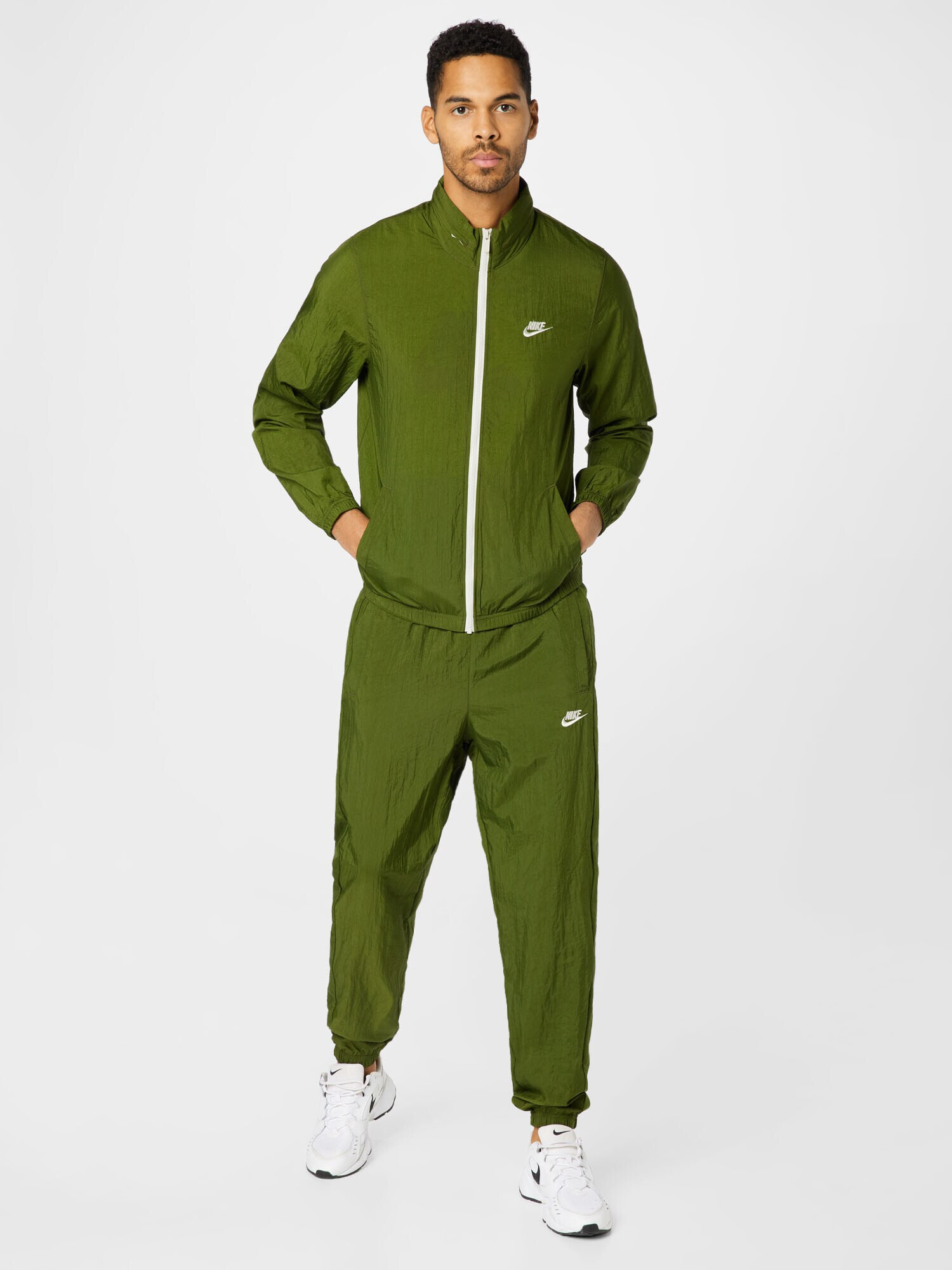 Nike Sportswear Trenirka za tek travnato zelena / bela - Pepit.si