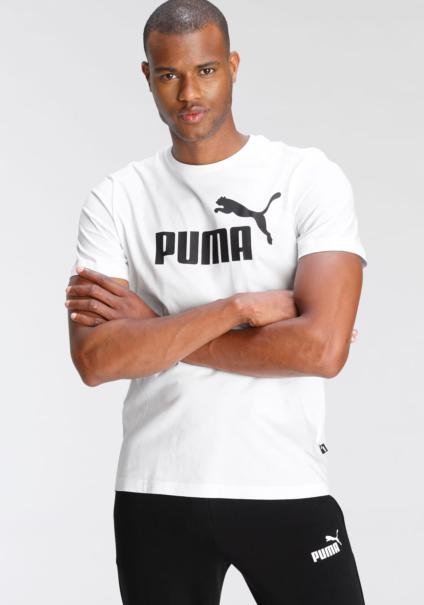 PUMA Funkcionalna majica črna / bela - Pepit.si