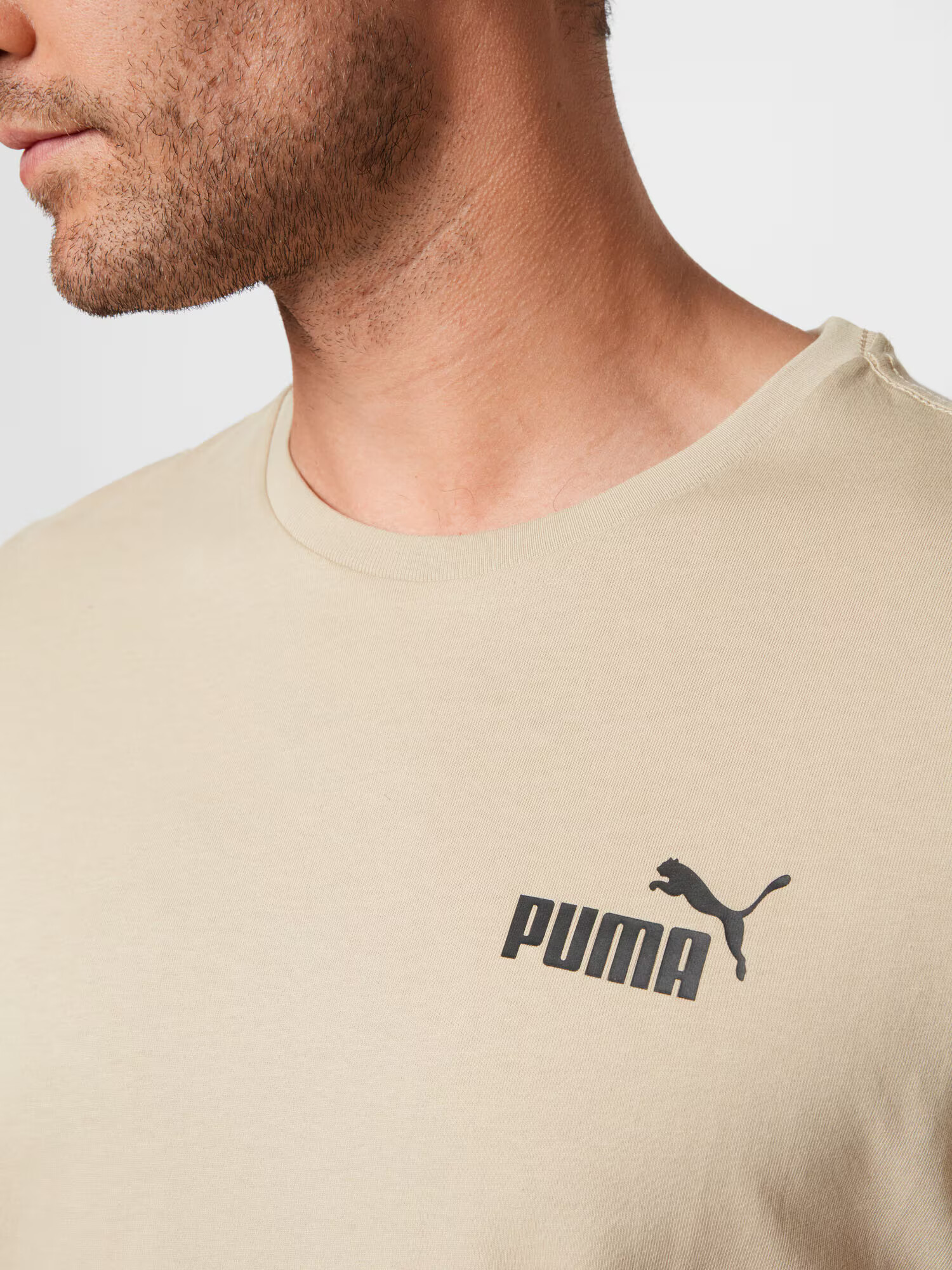 PUMA Funkcionalna majica pesek / črna - Pepit.si