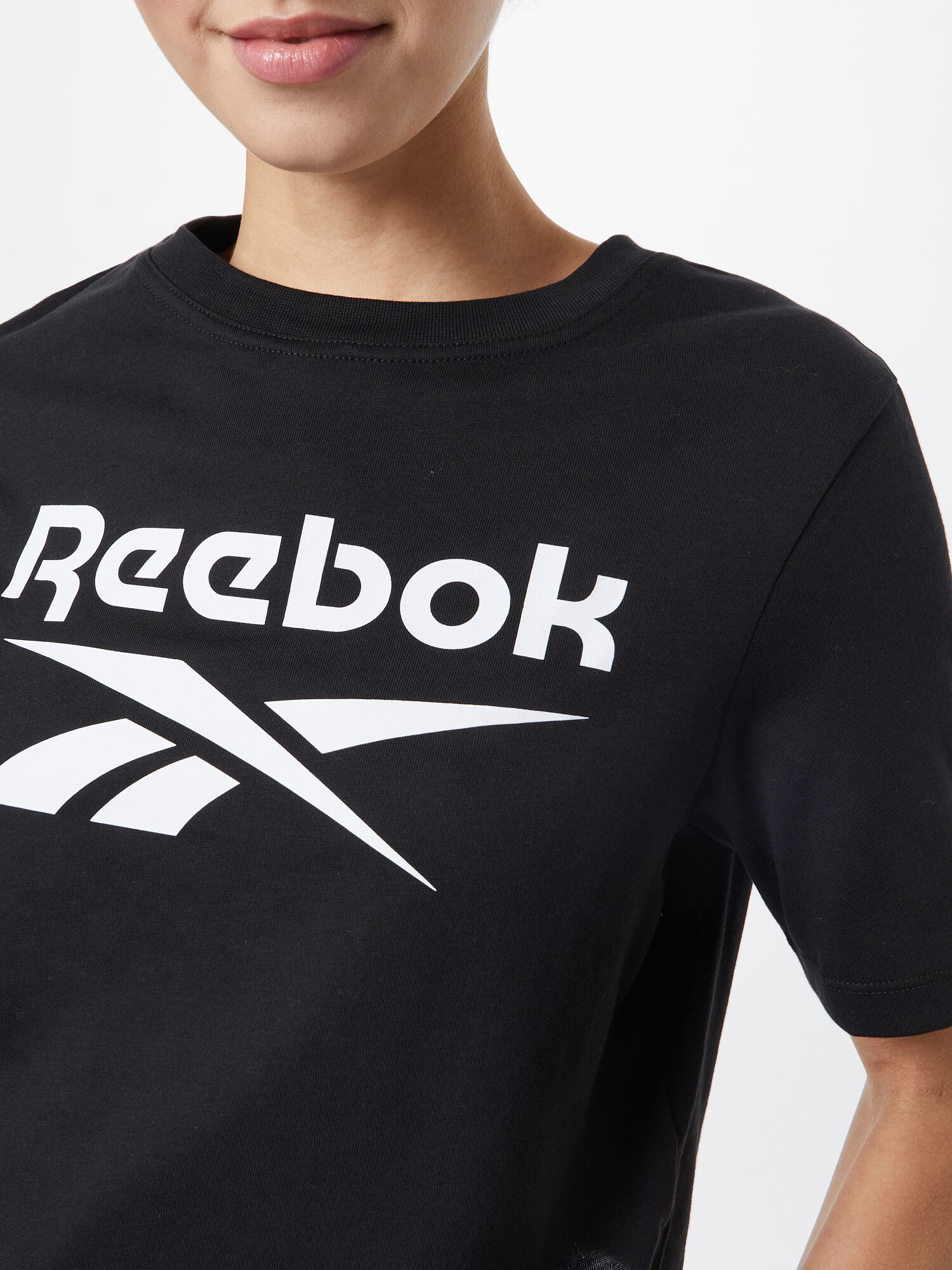 Reebok Sport Majica pastelno modra / črna - Pepit.si