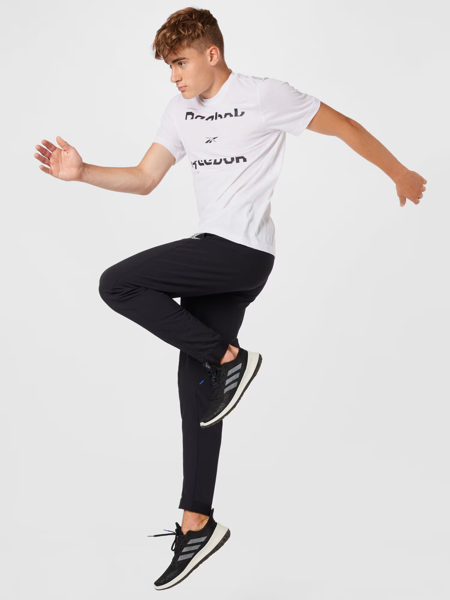 Reebok Sport Funkcionalna majica črna / bela - Pepit.si