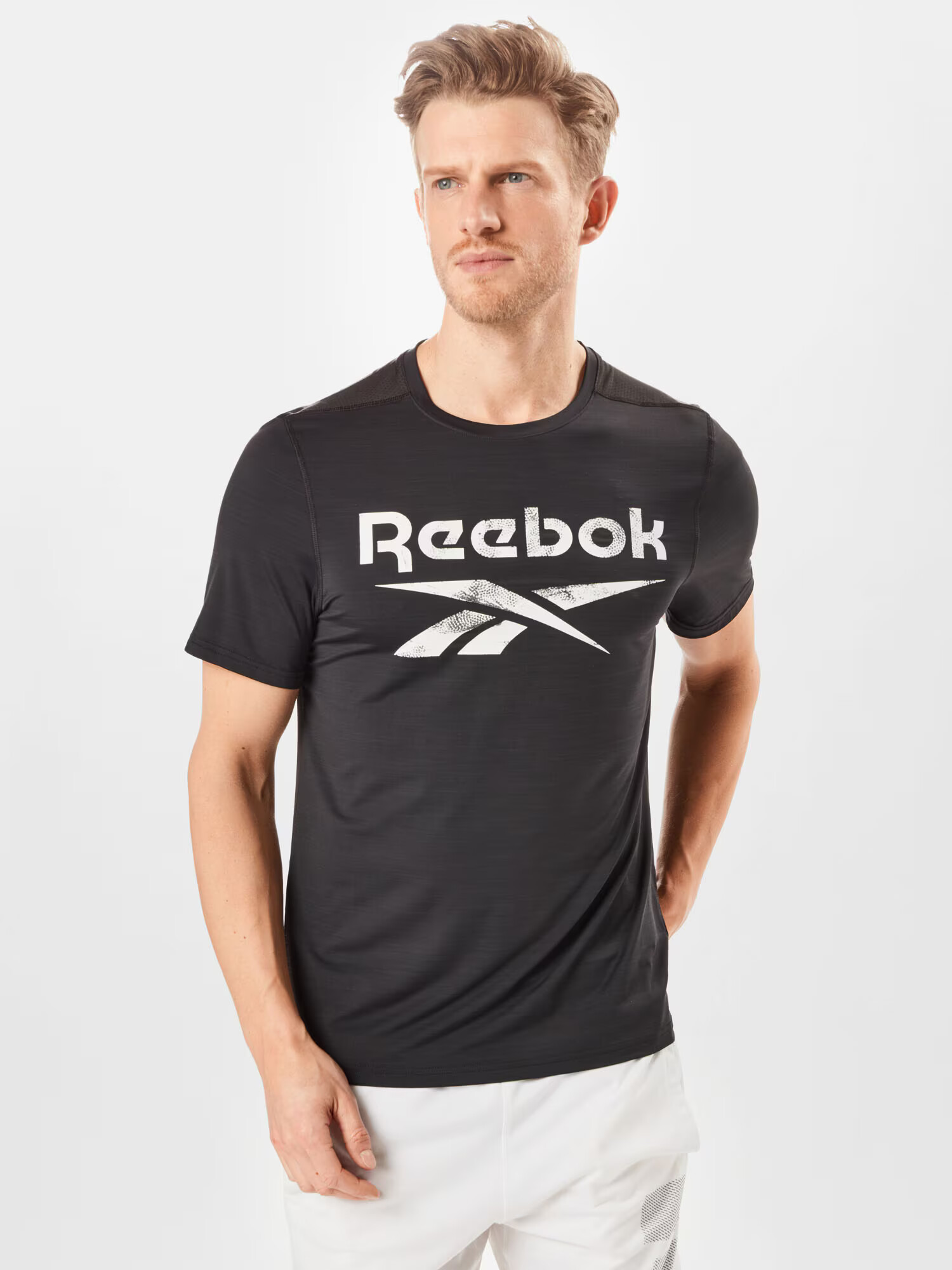 Reebok Sport Funkcionalna majica črna / bela - Pepit.si