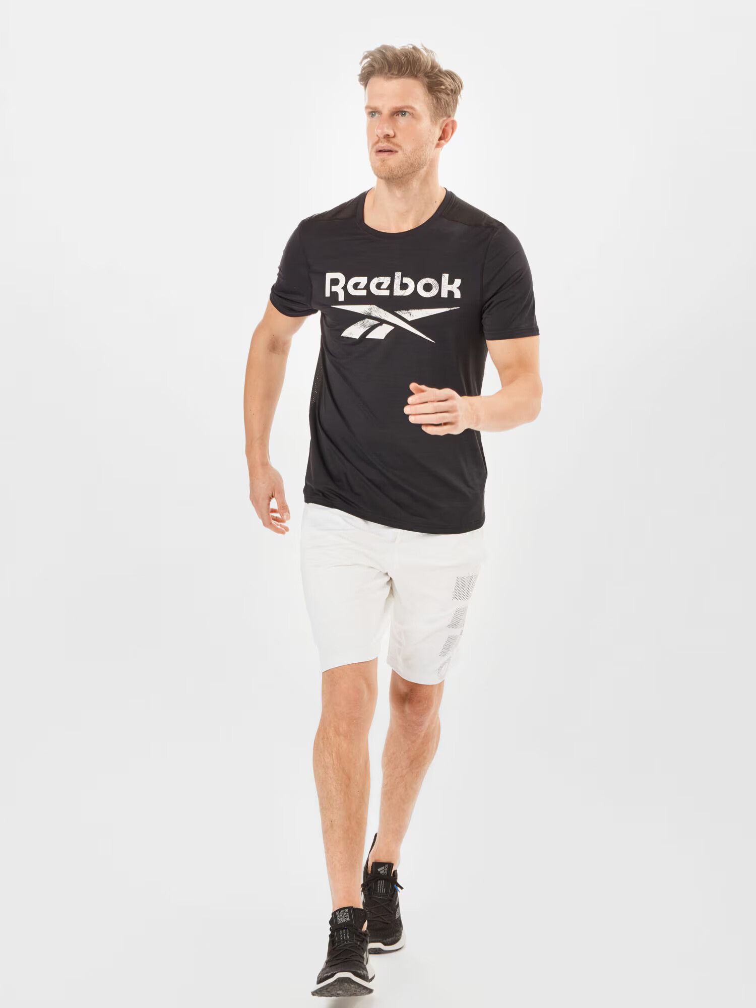 Reebok Sport Funkcionalna majica črna / bela - Pepit.si