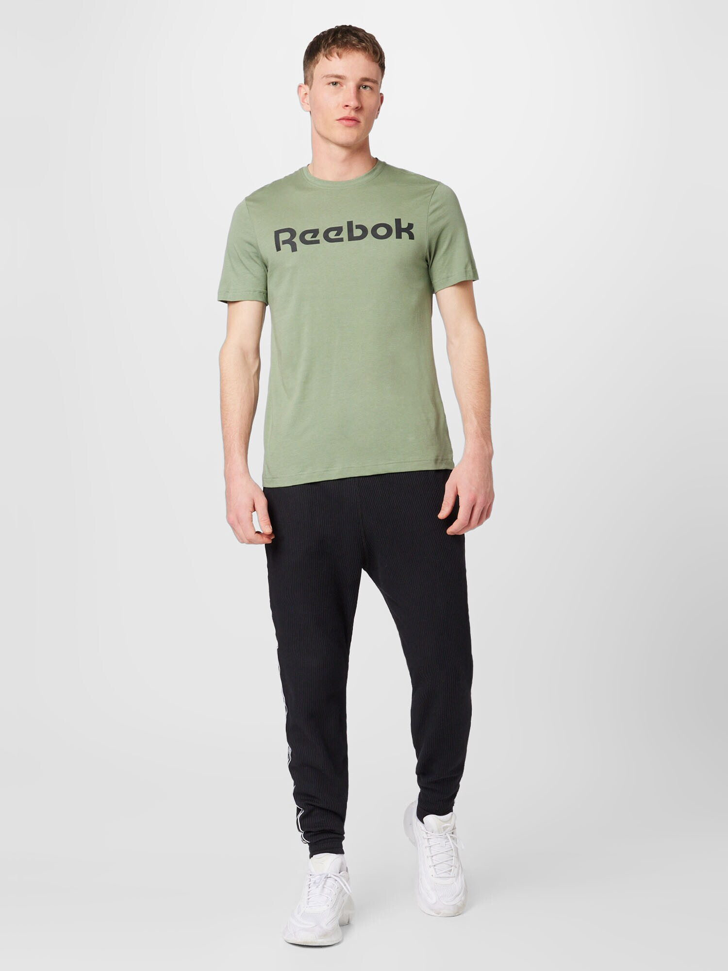 Reebok Sport Funkcionalna majica pastelno zelena / črna - Pepit.si