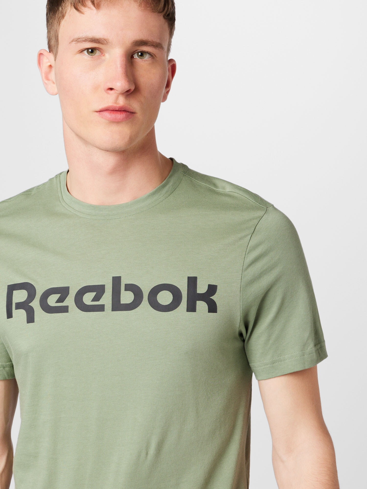 Reebok Sport Funkcionalna majica pastelno zelena / črna - Pepit.si