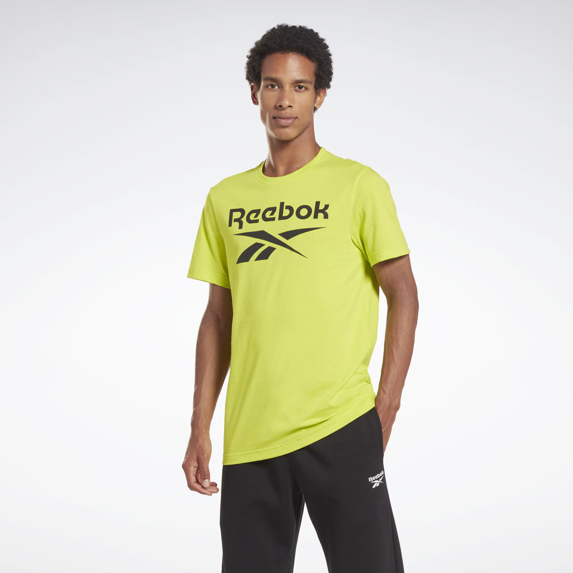 Reebok Sport Funkcionalna majica rumena / črna - Pepit.si