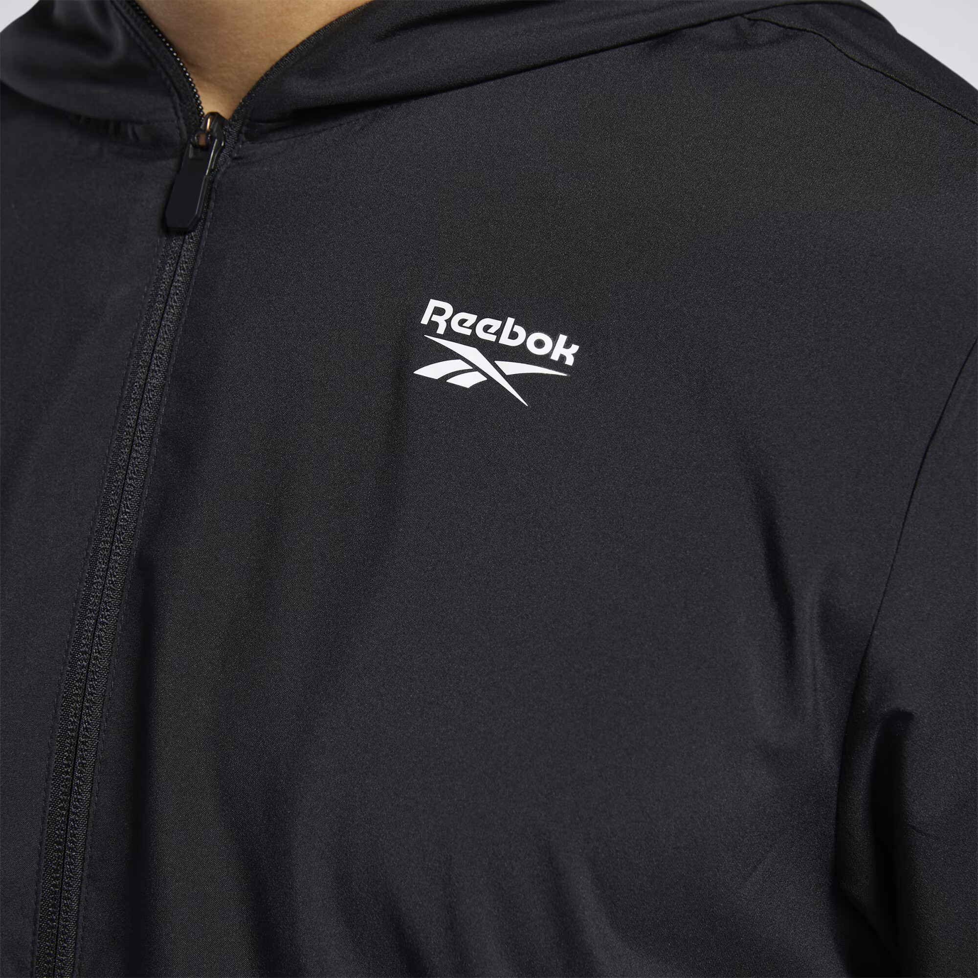 Reebok Sport Športna jakna črna - Pepit.si