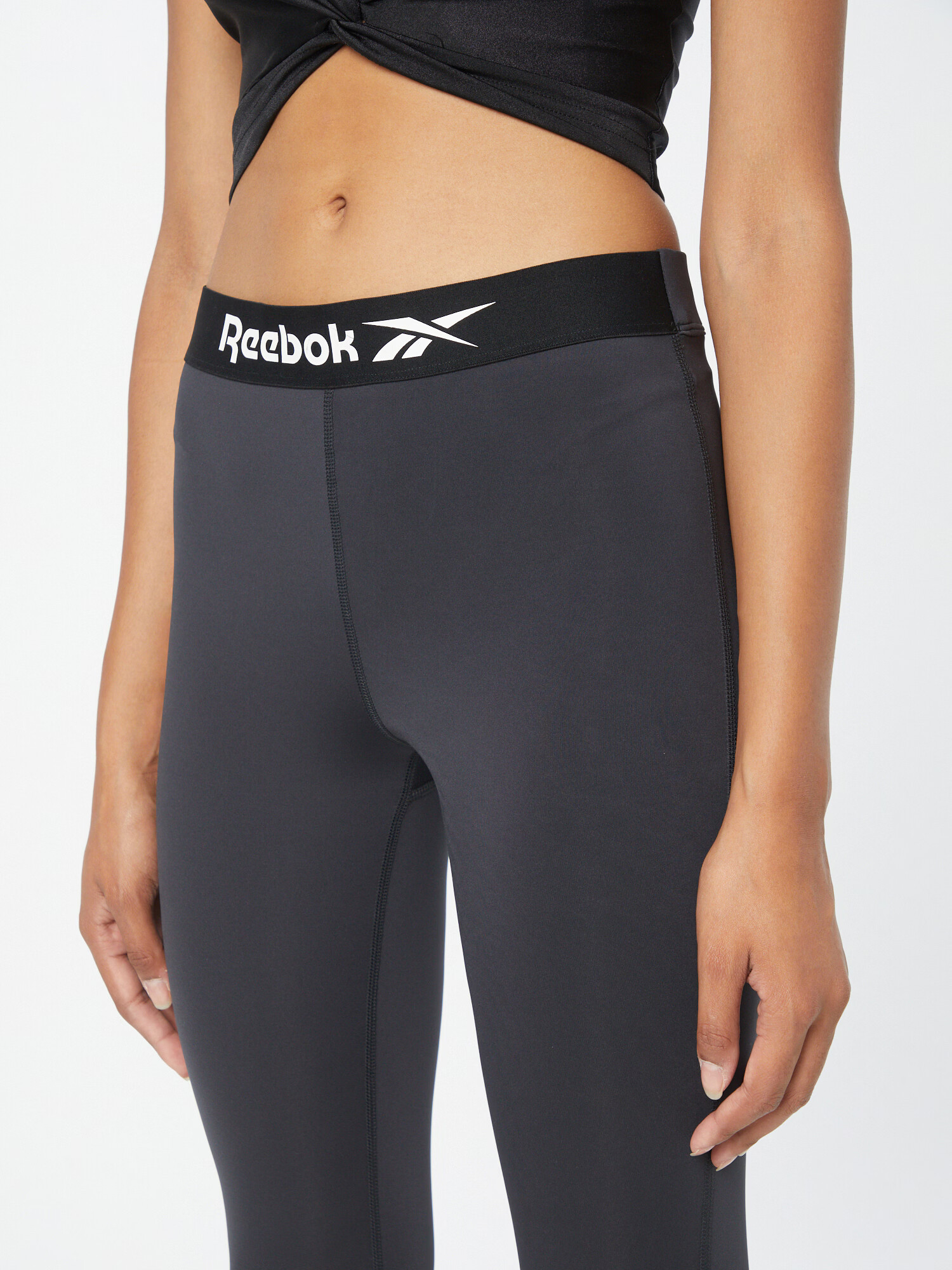 Reebok Sport Športne hlače črna / bela - Pepit.si