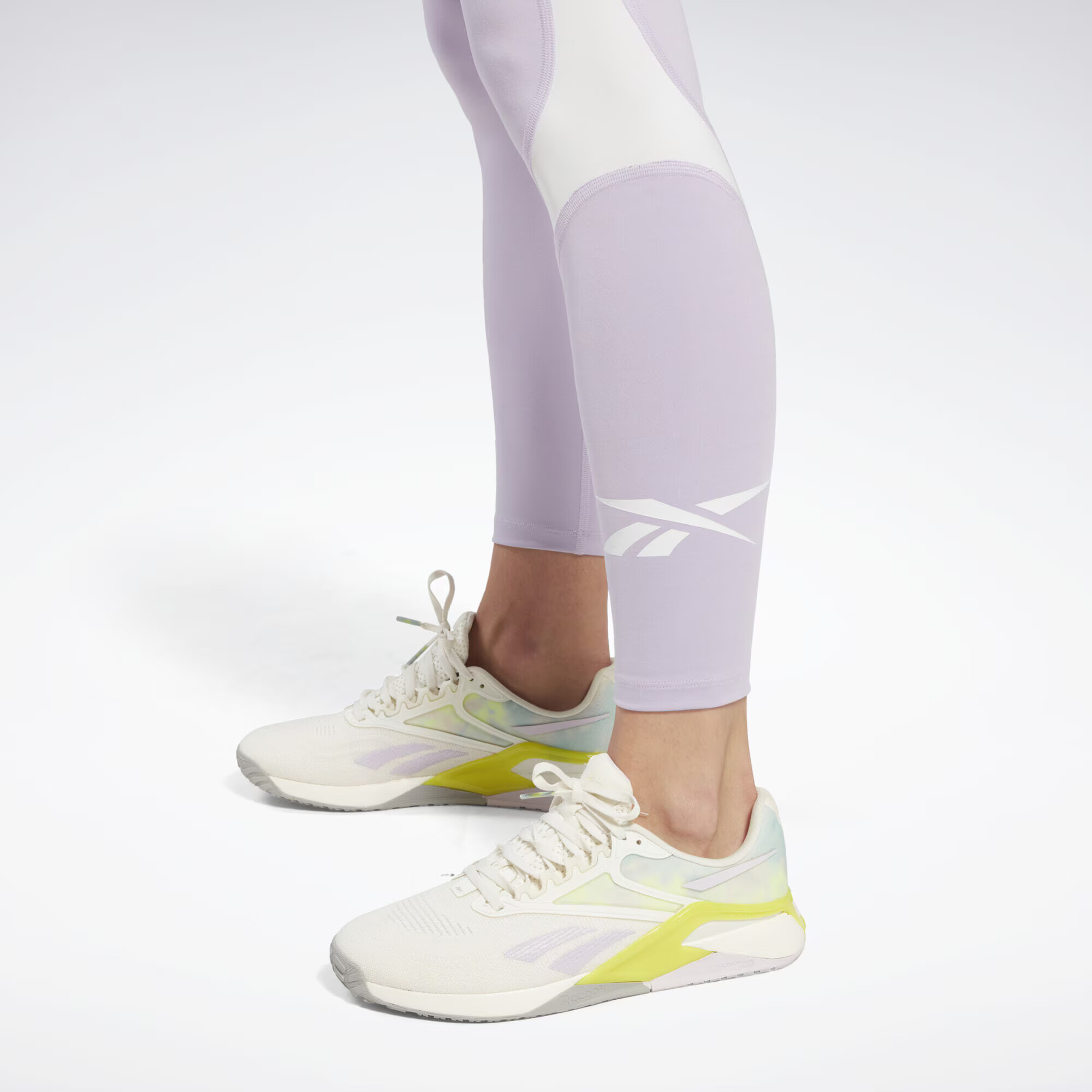 Reebok Sport Športne hlače 'Vector' pastelno lila / bela - Pepit.si