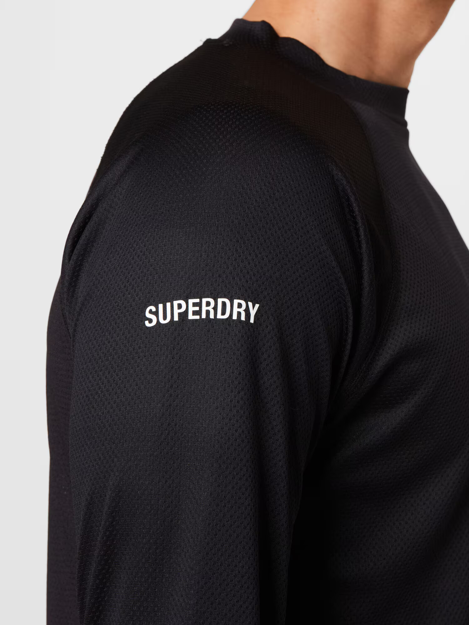 Superdry Funkcionalna majica črna / bela - Pepit.si