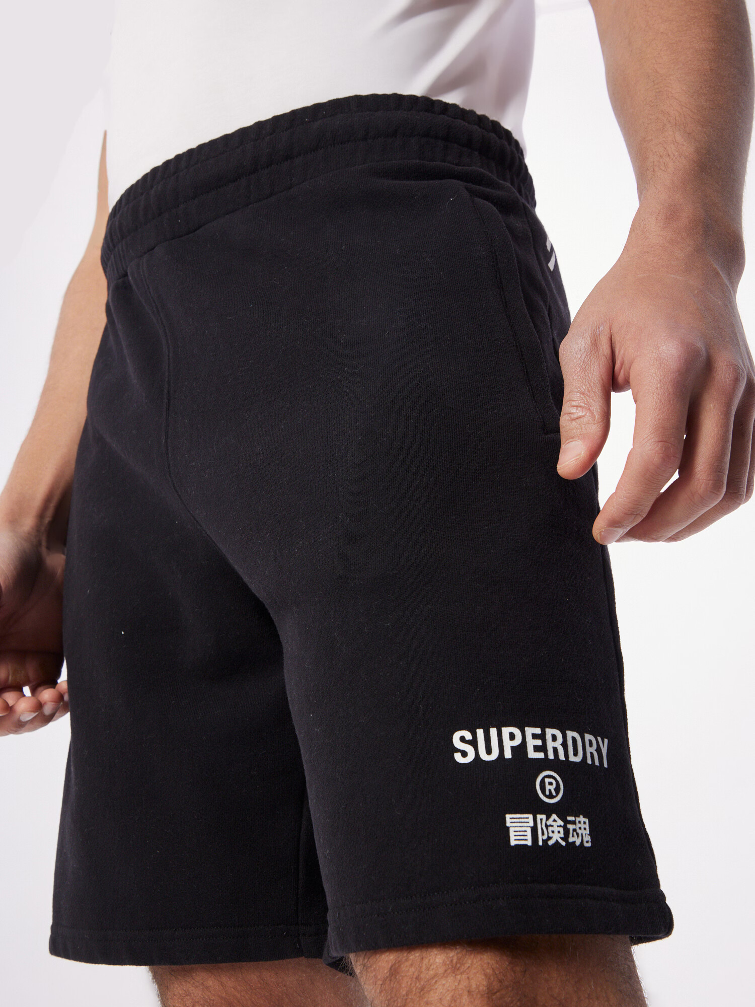 Superdry Hlače črna / bela - Pepit.si