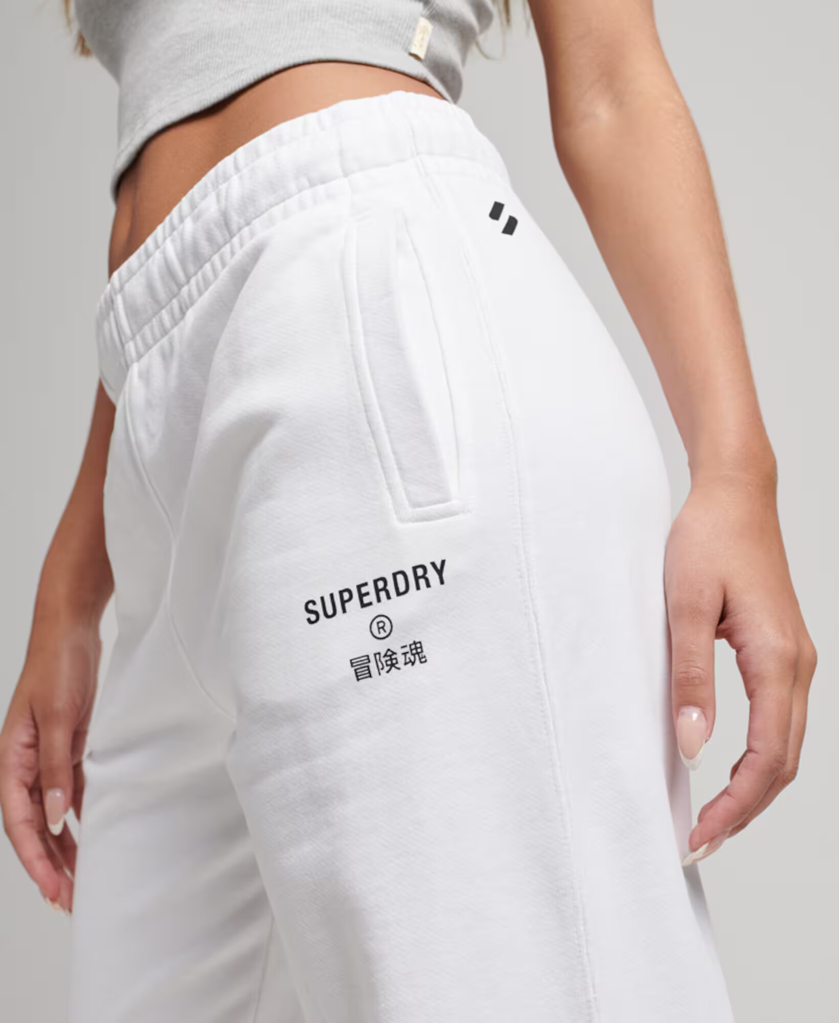 Superdry Hlače črna / bela - Pepit.si