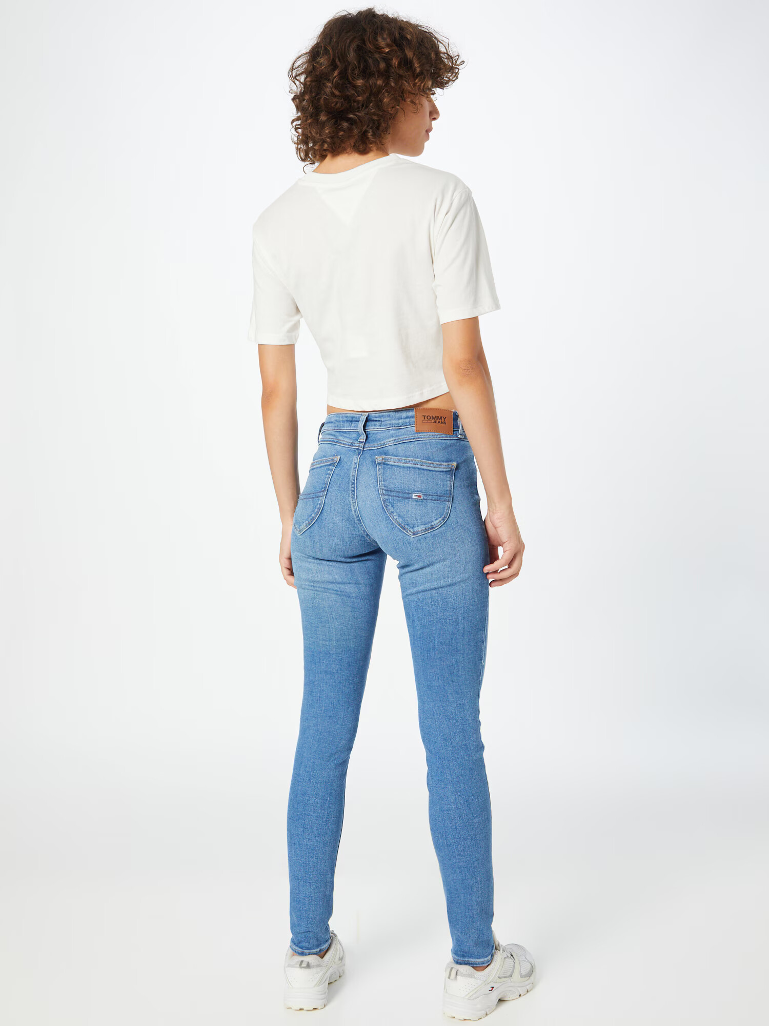 Tommy Jeans Kavbojke 'Sophie' moder denim - Pepit.si