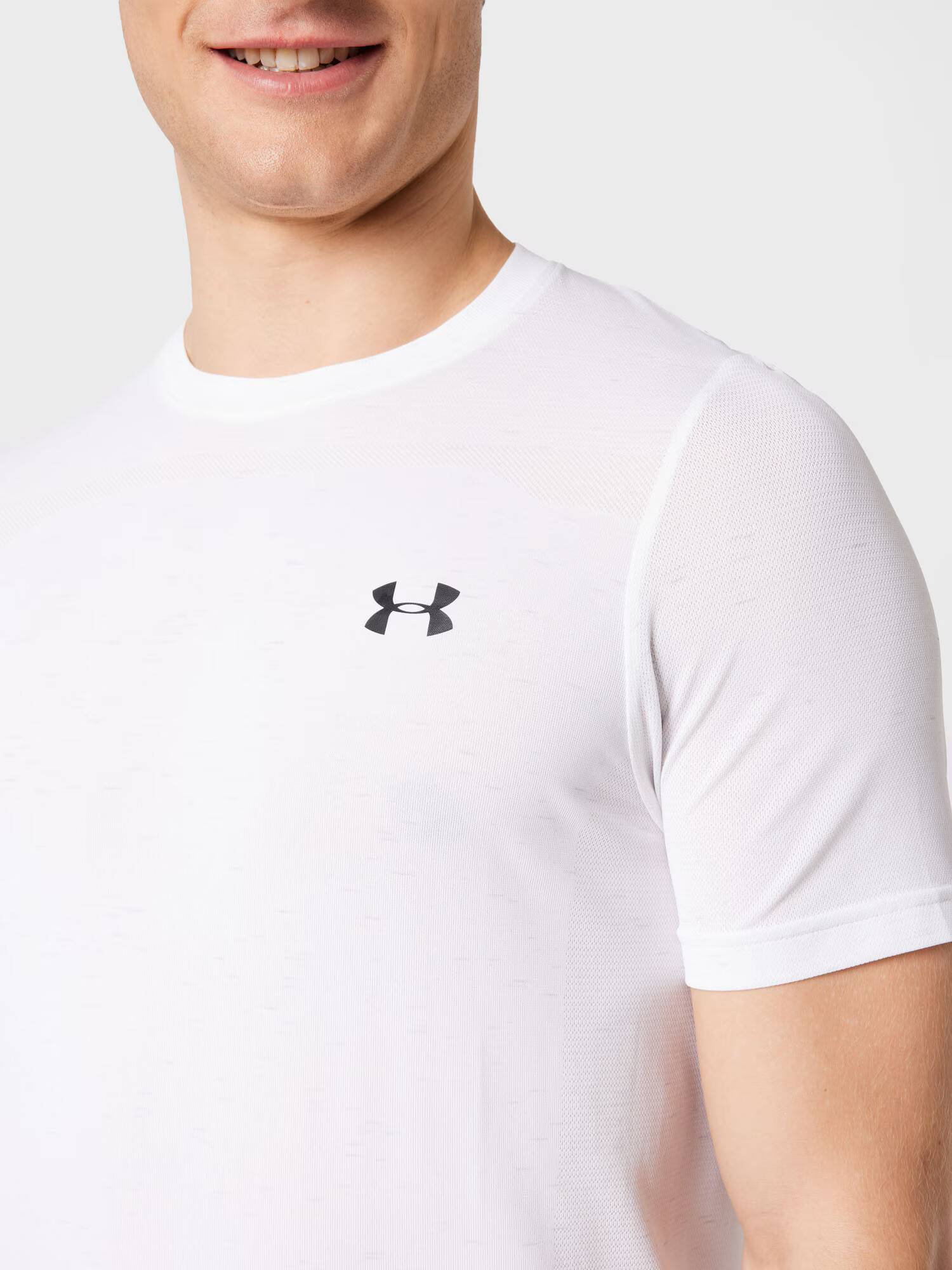 UNDER ARMOUR Funkcionalna majica črna / bela - Pepit.si