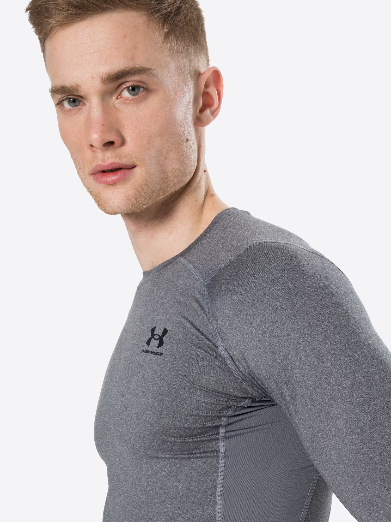 UNDER ARMOUR Funkcionalna majica pegasto siva - Pepit.si