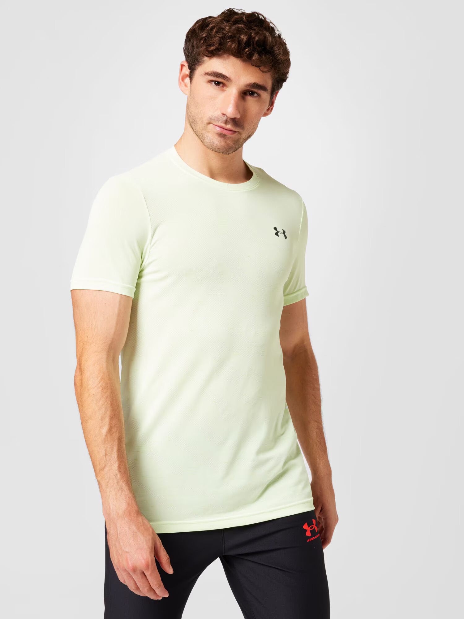 UNDER ARMOUR Funkcionalna majica 'Radial' pastelno zelena / črna - Pepit.si