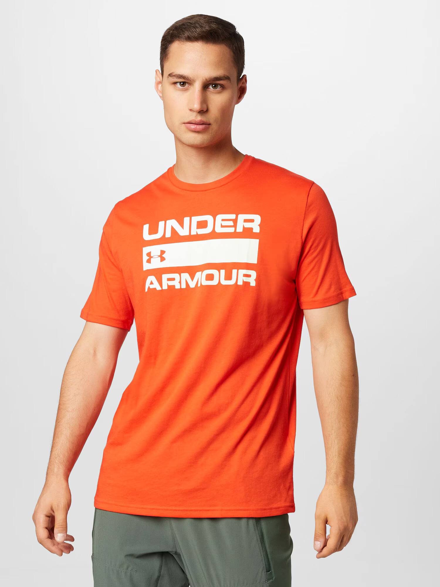 UNDER ARMOUR Funkcionalna majica 'Team Issue' oranžno rdeča / bela - Pepit.si